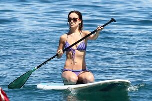 Olivia Wilde on the beach and in